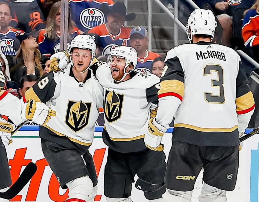 Vegas Golden Knights players cheering with teammates
