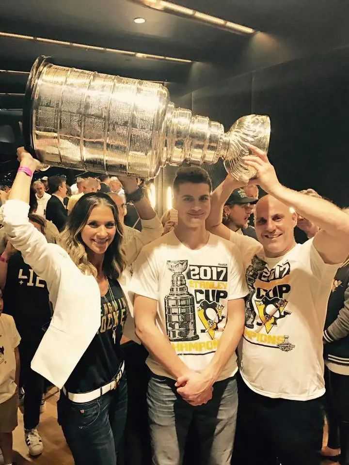 Lynne, Trevor and Rick (from left to right) holding the Stanley Cup 2017