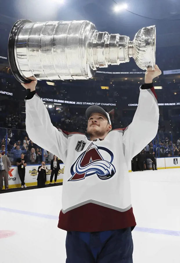 Makar lifting the Stanley Cup championship title in 2022