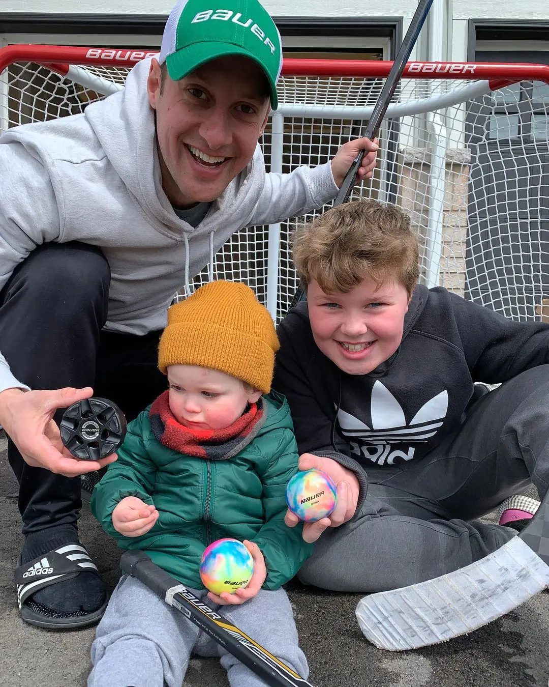 Sean with his two sons Hanen and Reid promoting BAUER Hockey equipments