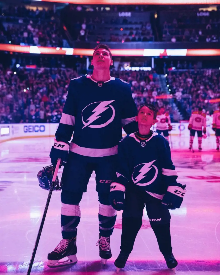 Yanni scoring 100th point with the lightning with his fan Benjamin