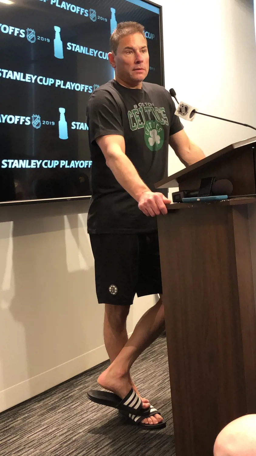 Cassidy in press meet wearing T-shirt of Boston Celtics, an Eastern Conference Basketball team in NBA