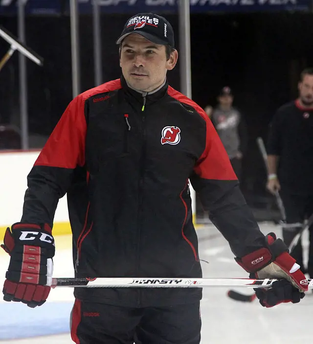Sergei holding a hockey stick during a training session of the franchise