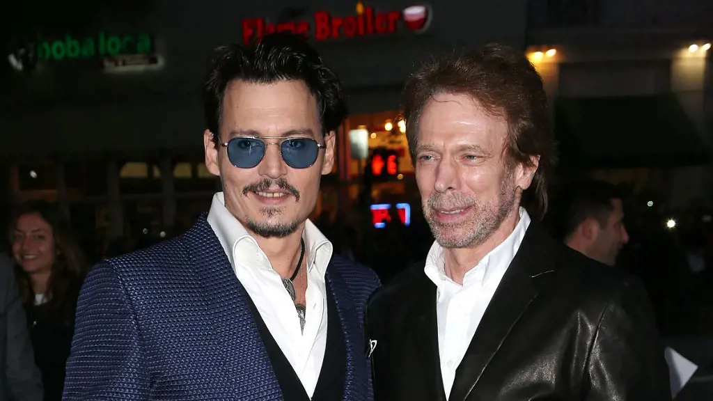 Bruckheimer with actor Johnny Depp in 2014